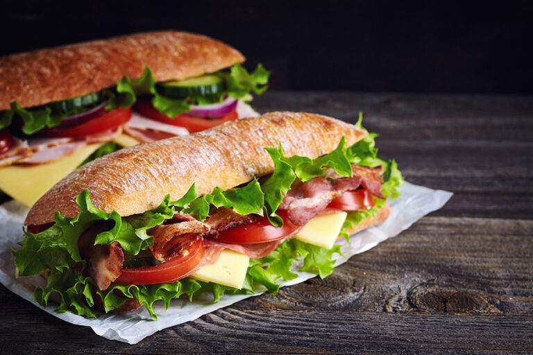 Business that prepares and distributes sandwiches/ ready-to-eat meals, in grocery stores and convenience stores in addition to a catering service